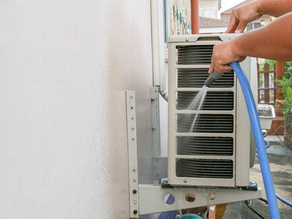 clean the heat pump outdoor unit with a high pressure water gun